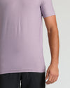 Iris Tall Active Crew Neck 2.0 in lavender, worn with black bottoms.