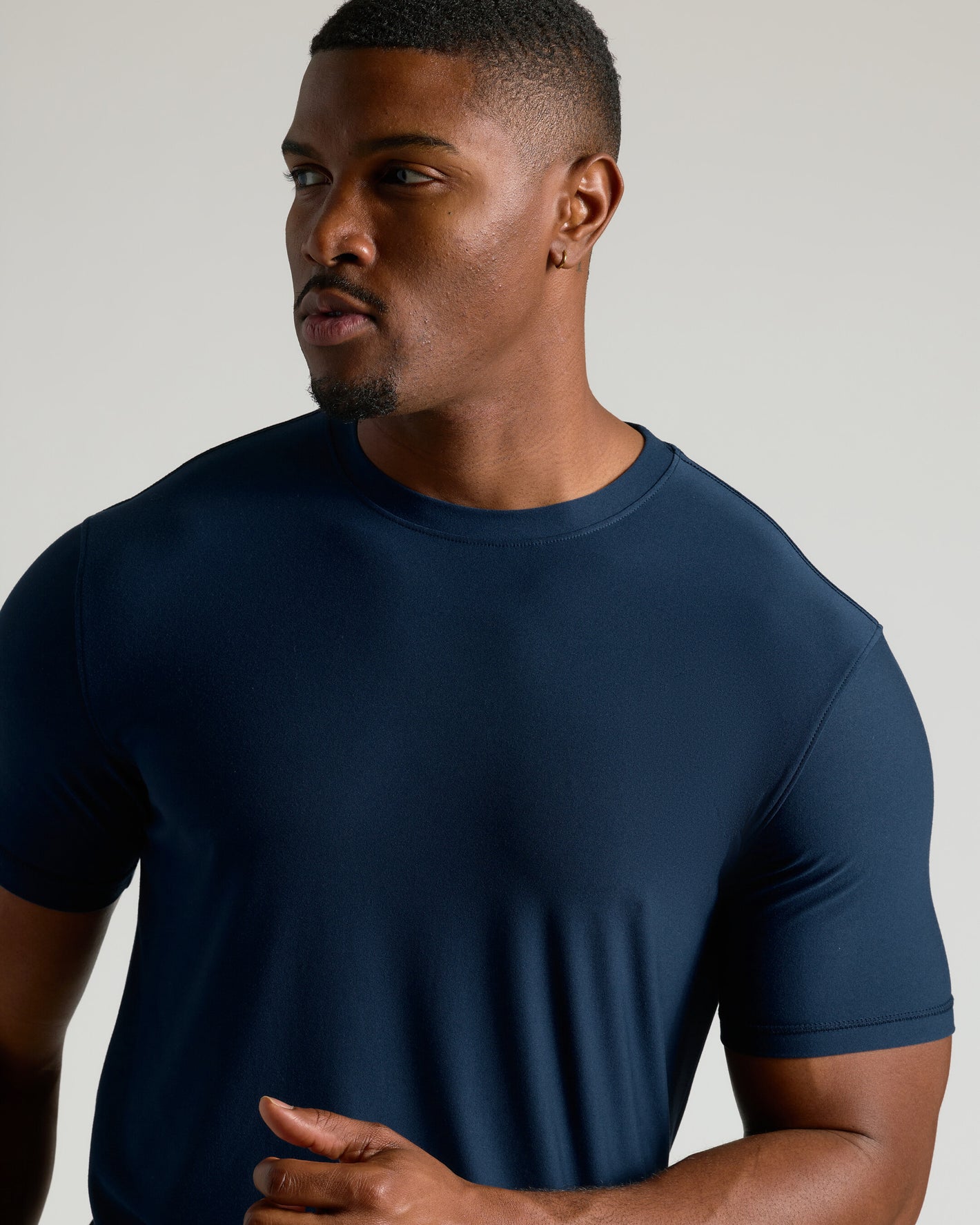 Navy Tall Active Crew Neck 2.0 worn by a young man.