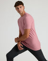 Quartz Rose Tall Active Crew Neck 2.0 on young man, stretching pose.