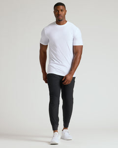 True ClassicWhite Tall Active Crew Neck 2.0 on athletic man, relaxed pose.