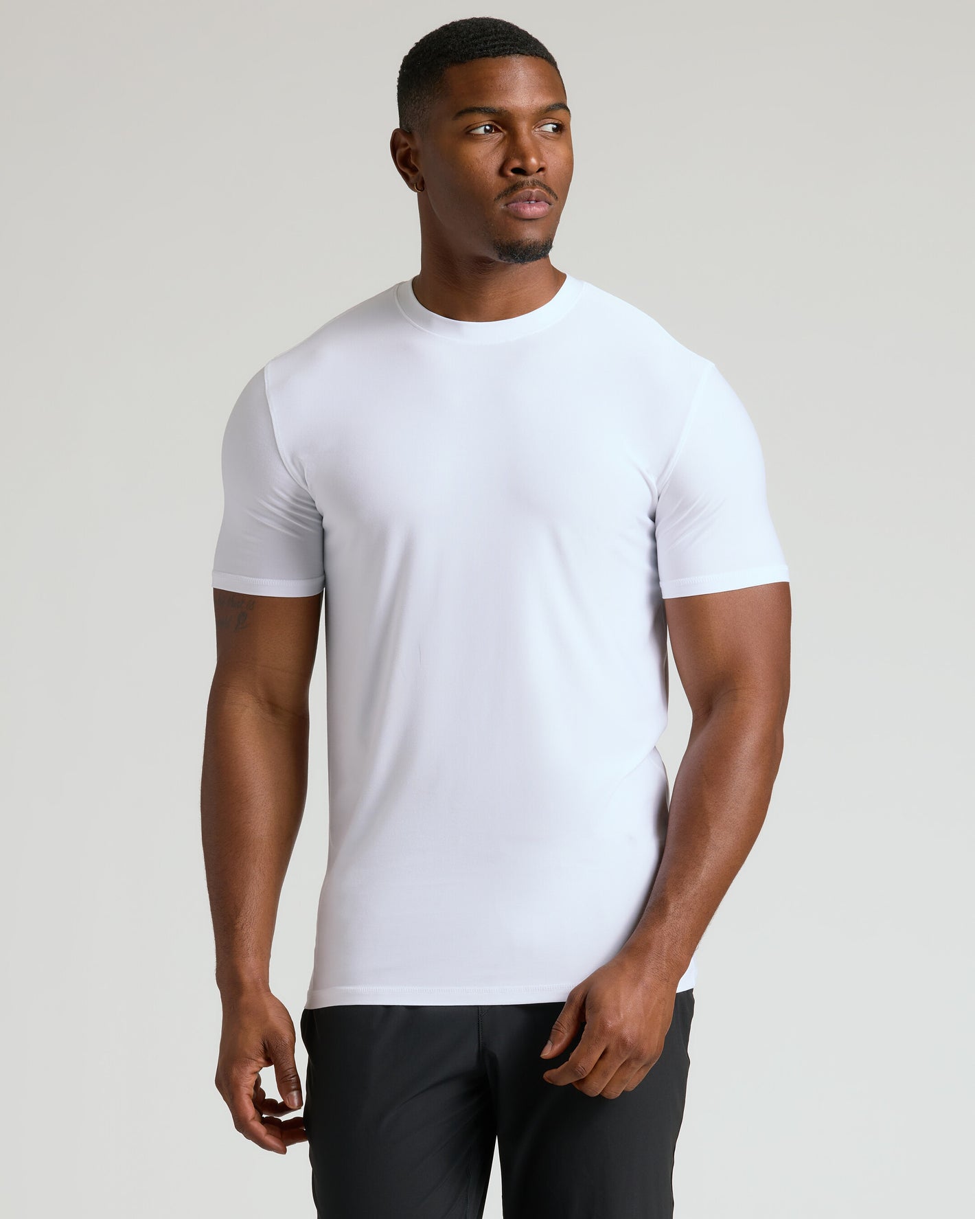 White Tall Active Crew 3-Pack on athletic man, showcasing fitted design.