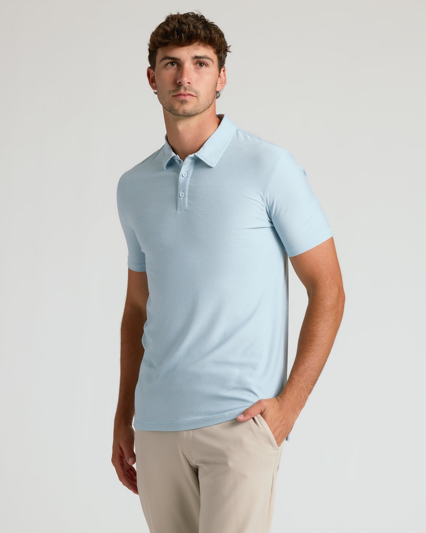 Model wearing Arctic Short Sleeve Tall Active Polo.