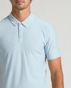 Man wearing Arctic Short Sleeve Tall Active Polo with classic collar and placket.