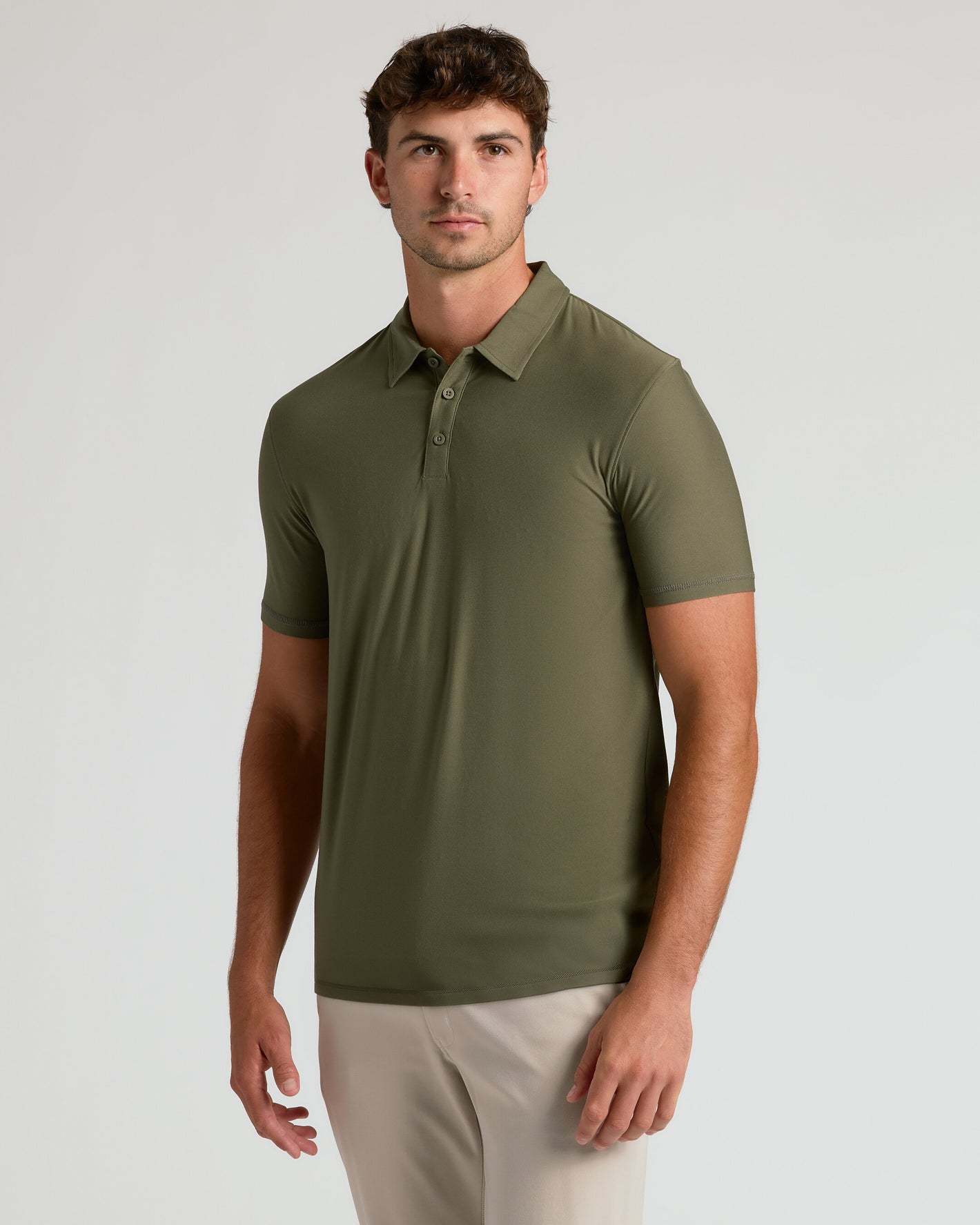 Man wearing Military Green Short Sleeve Tall Active Polo.