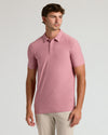 Model in Quartz Rose Short Sleeve Tall Active Polo, beige trousers.