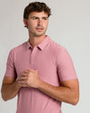 Young man wearing Quartz Rose Short Sleeve Tall Active Polo.