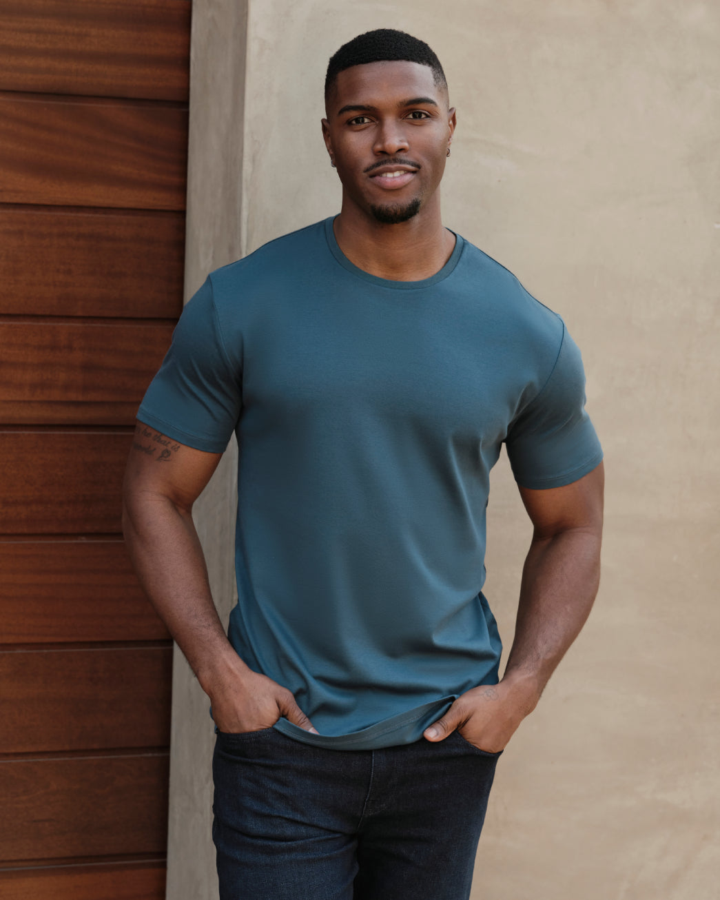 Lagoon Tall Premium Pima Crew Neck worn by a relaxed young man.