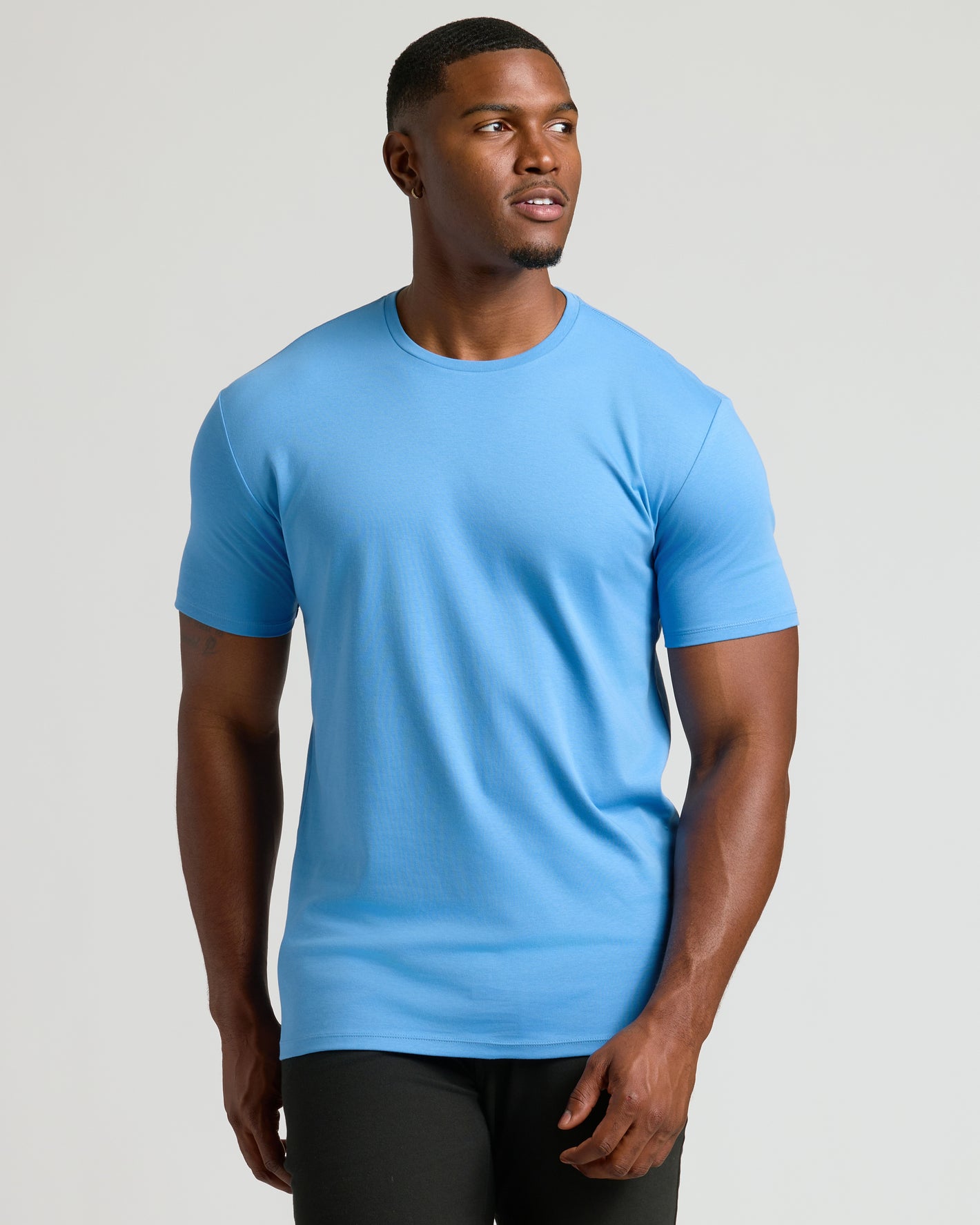 Cerulean Tall Premium Pima Crew Neck worn by a fit man.