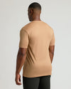 Man wearing Tahini Tall Premium Pima Crew Neck, back view.