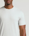 Man wearing Seasonal Tall Premium Pima Crew Neck Tee, showcasing smooth, light-colored fabric.
