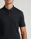 Man wearing Black Tall Premium Pima Polo, showcasing its tailored fit.