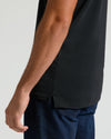 Side view of Black Tall Premium Pima Polo with side hem slit.