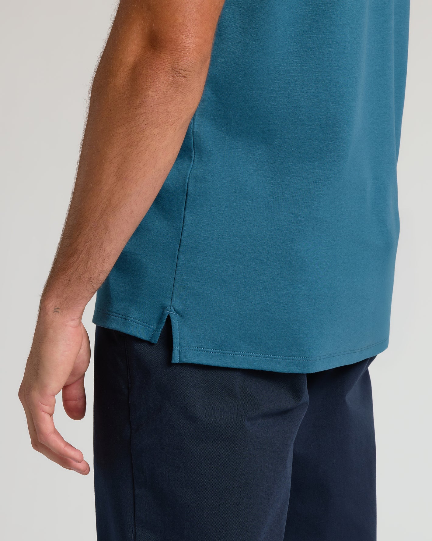 Lagoon Tall Pima Polo showcasing side-slit hem and tailored fit.