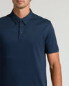 Navy Tall Pima Polo worn by man, showcasing tailored fit.