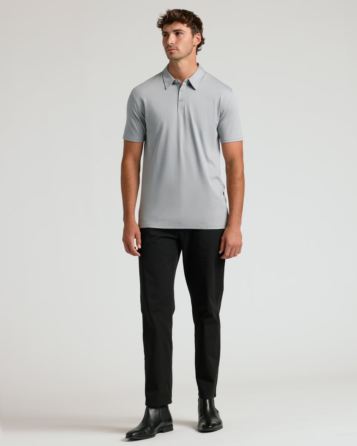 Steel Tall Premium Pima Polo on male model, paired with black pants.