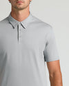 Man wearing Steel Tall Premium Pima Polo with pointed collar and buttons.