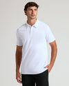 Young man in Black & White Tall Premium Pima Polo, casual pose.