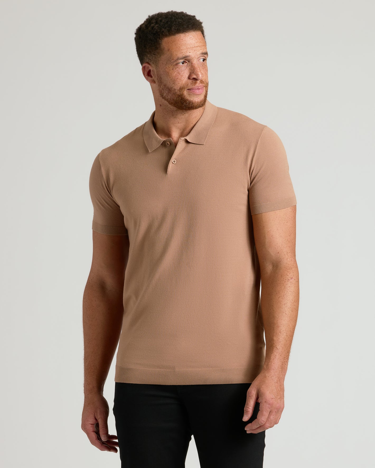 Staple Tall Dressy Polo 6-Pack worn by male model against plain backdrop.