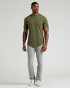 Military Green Short Sleeve Tall Curved Hem Crew on a fit man.