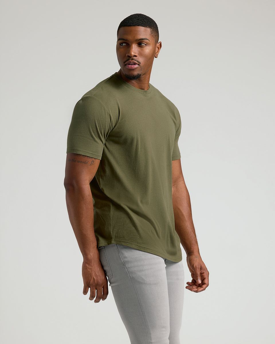 Young man in Military Green Short Sleeve Tall Curved Hem Crew.