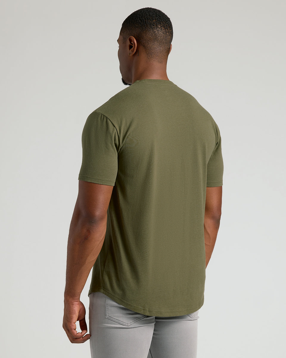 Military Green Short Sleeve Tall Curved Hem Crew on man’s back view.
