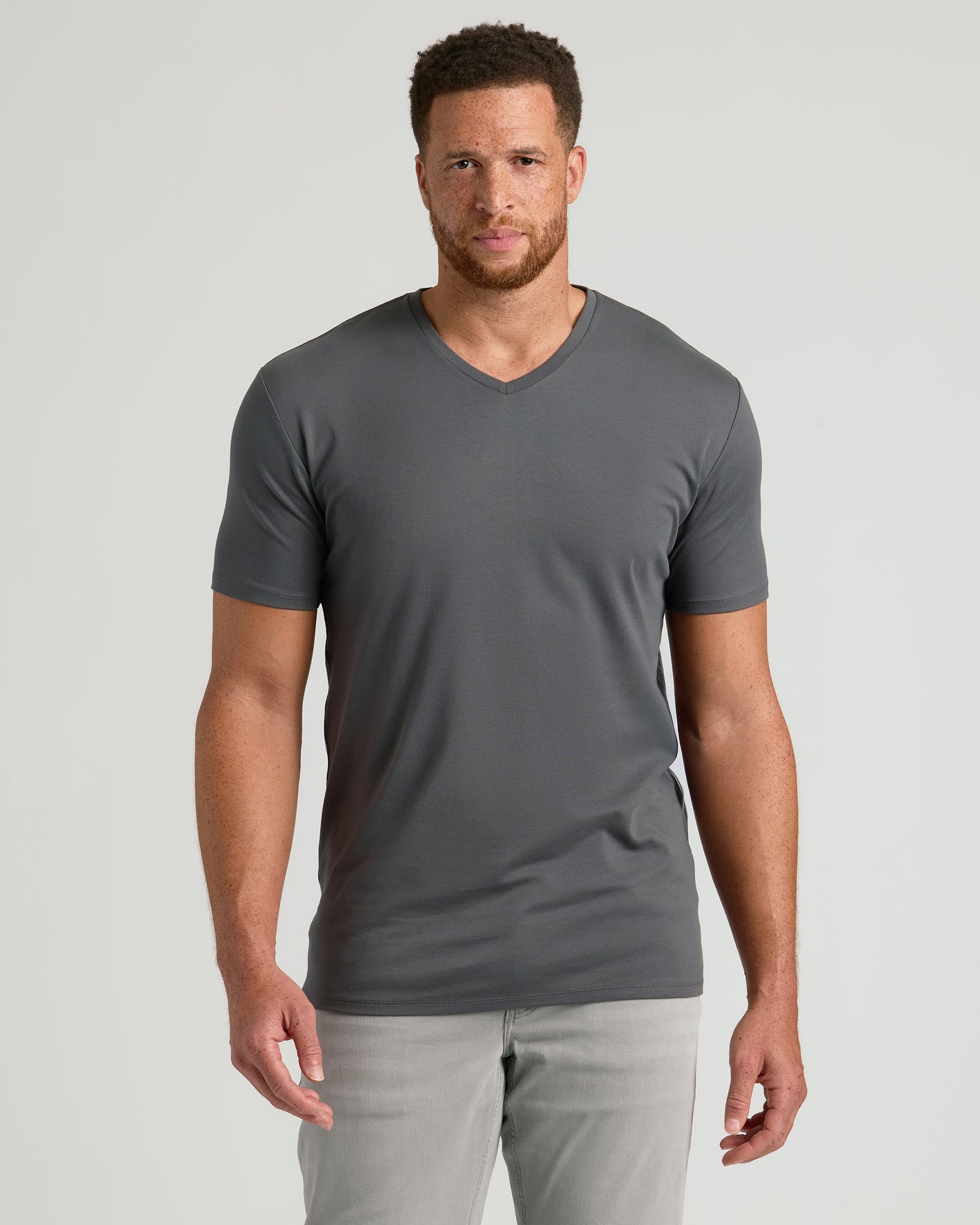 Tall Premium Pima V-Neck 4-Pack on man with relaxed arms.