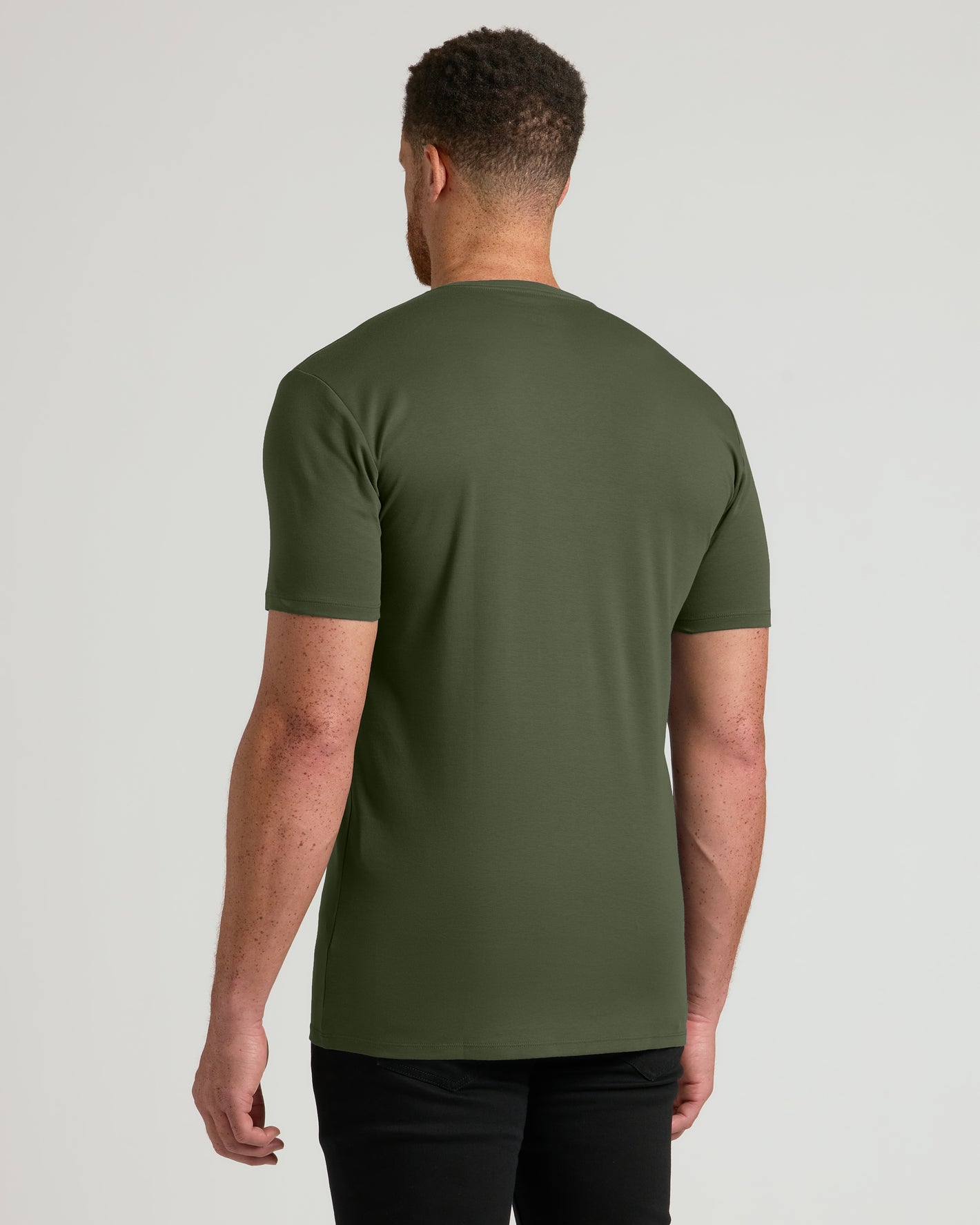 Grove Tall Premium Pima V-Neck worn from behind, showcasing fit.