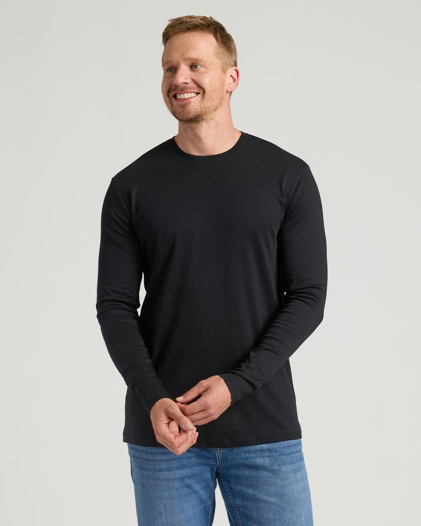Tall Pima Variety 2-Pack: man wearing black crewneck and jeans.