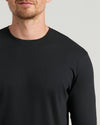 Man wearing All Black Tall Premium Pima Long Sleeve Crew.