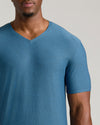 Man wearing Dark Heather Bluebird Tall Active V-Neck T-shirt.