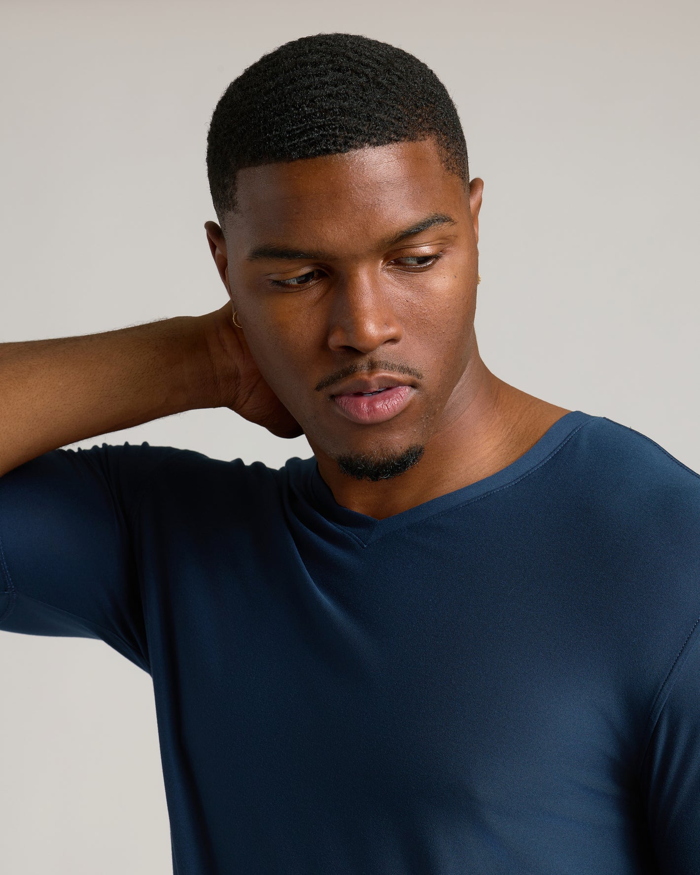 Young man wearing Navy Tall Active V-Neck.
