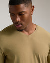 Overland Tall Active V-Neck worn by young man with hoop earring.