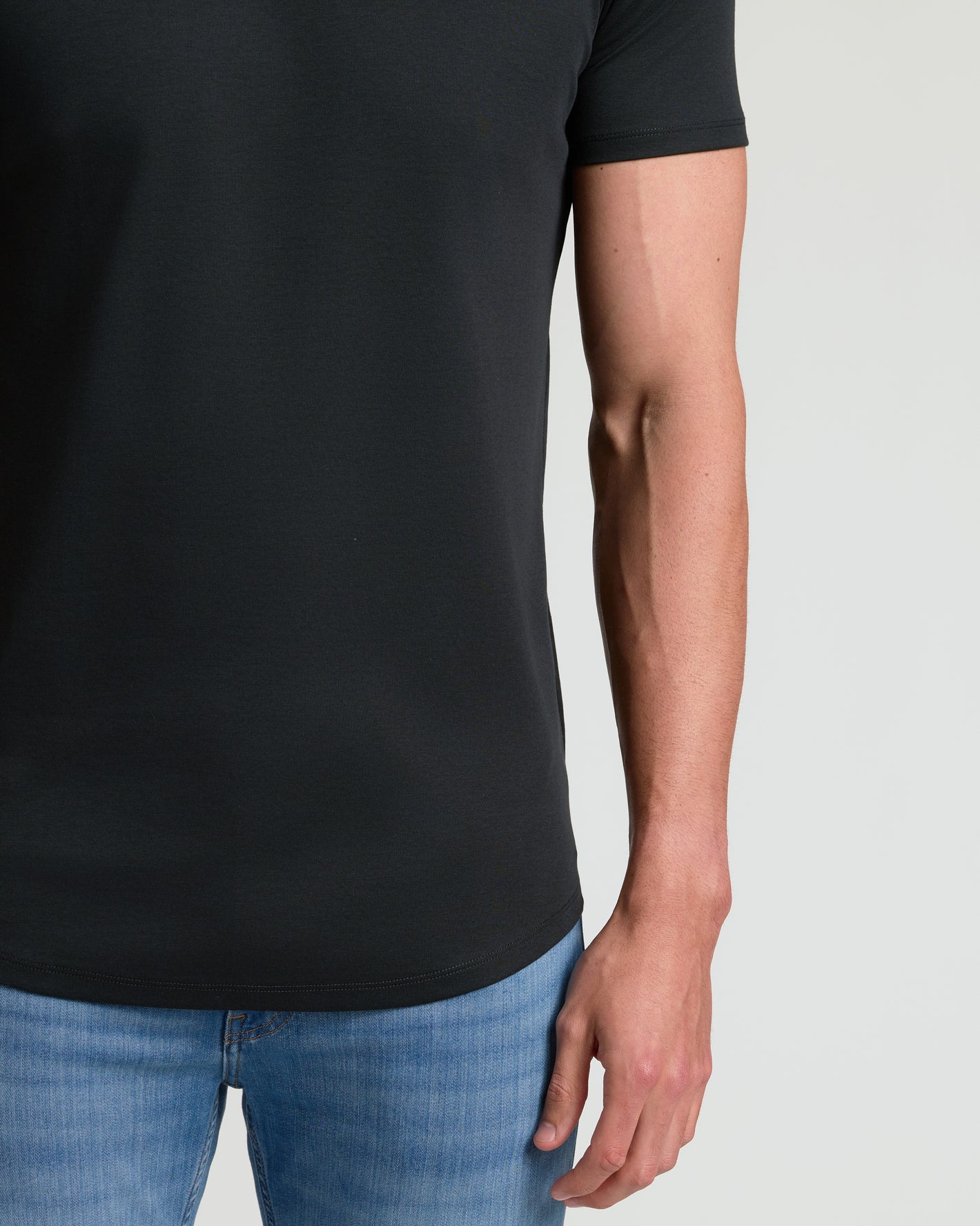 Black Tall Premium Pima Crew Curved Hem T-shirt with medium-wash jeans.