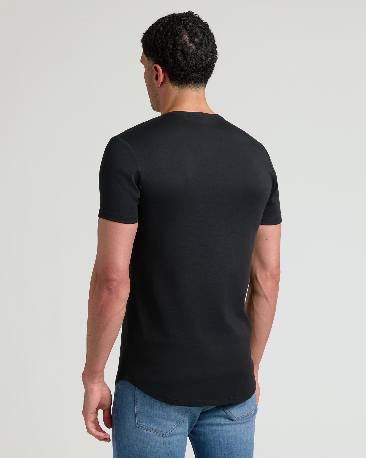 Black Tall Premium Pima Crew Curved Hem T-shirt, back view, in studio.