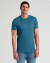 Man wearing Navy & Lagoon Tall Premium Pima Crew Curved Hem tee.