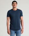 Wardrobe Tall Premium Pima Crew Curved Hem Tee in navy on model.