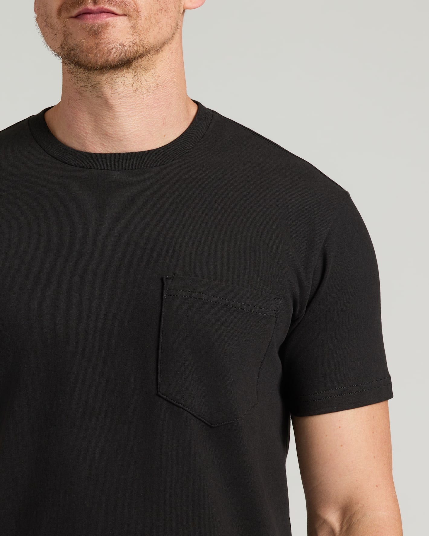 Black Tall Heavyweight Pocket Crew with chest pocket and extended sleeves.