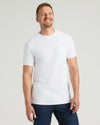 White Tall Heavyweight Pocket Crew worn by man in jeans, smiling.