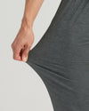 Hand pulling Charcoal Heather Gray Tall Active Joggers' stretchy, soft knit fabric.