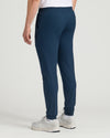 Dark Heather Navy Tall Active Joggers with gray sneakers, rear view.