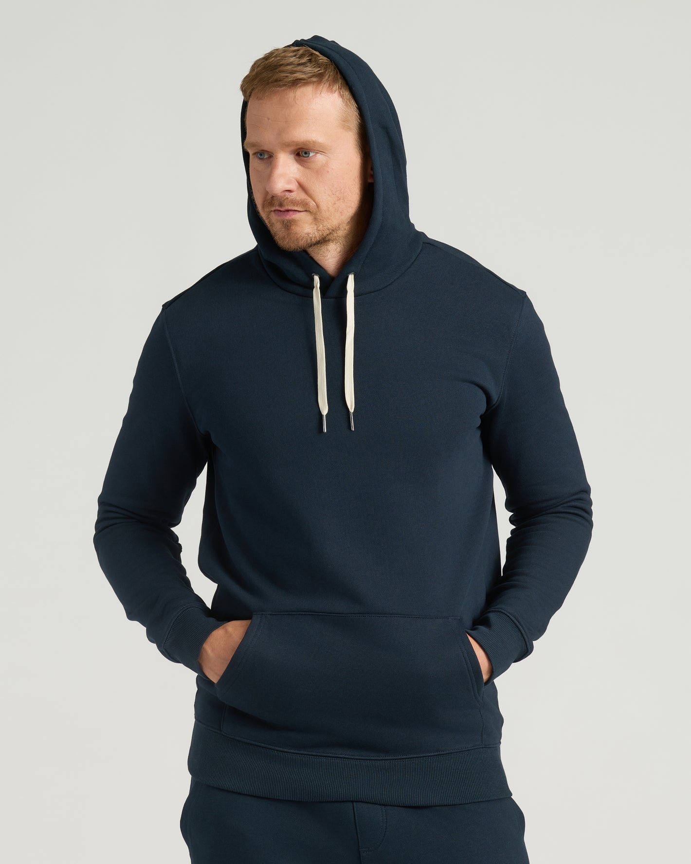 Model in Navy Tall Fleece Pullover Hoodie from 2-Pack.