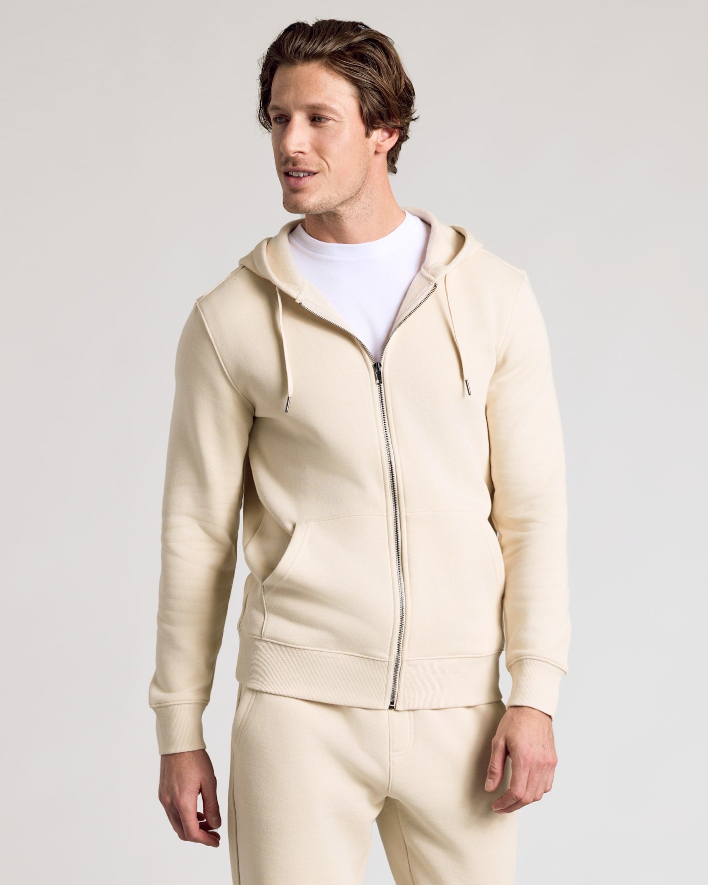 Dune Fleece French Terry Zip Hoodie worn by man.