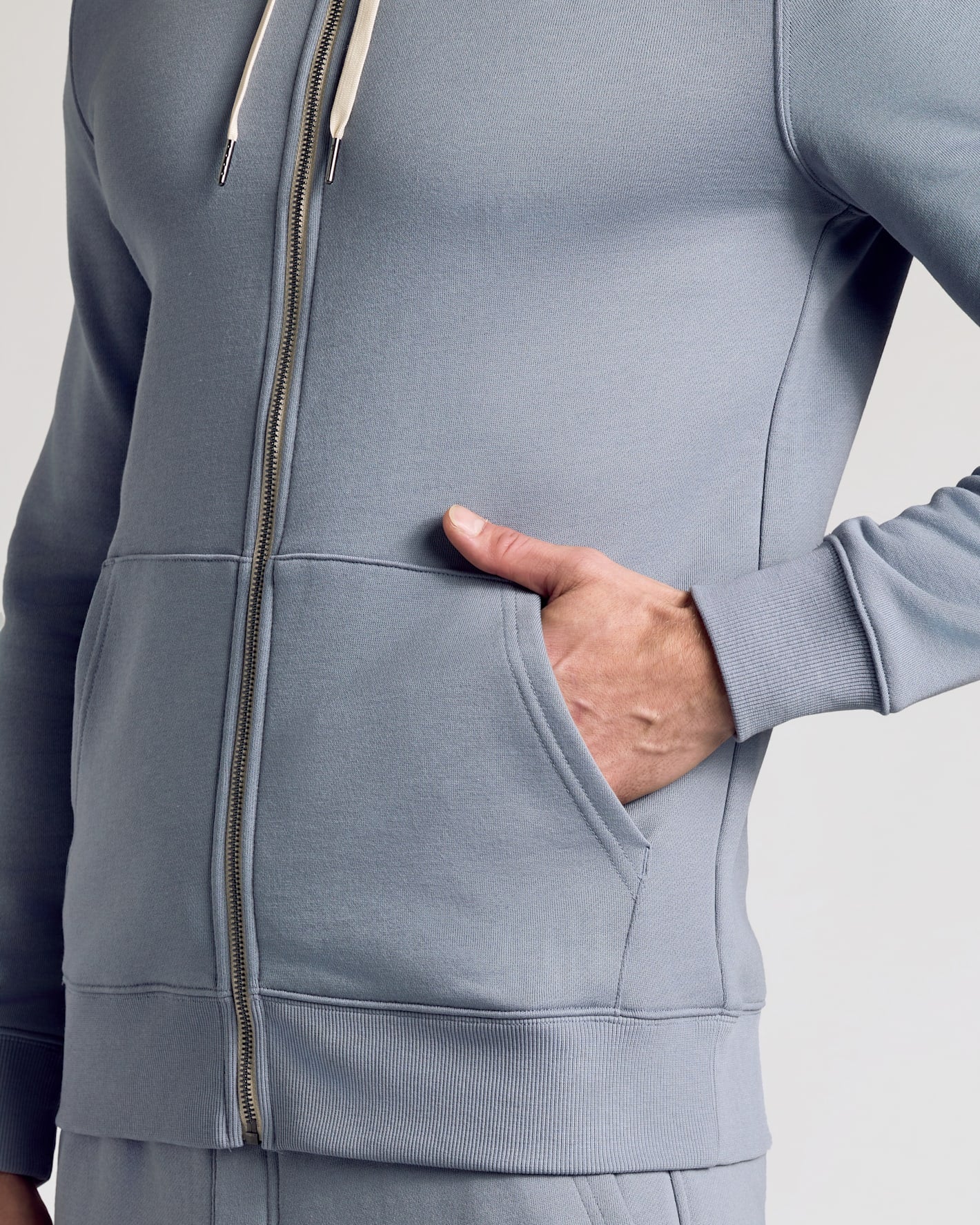 Person wearing Dusty Blue Full Zip Fleece Hoodie & Jogger 2-Pack.