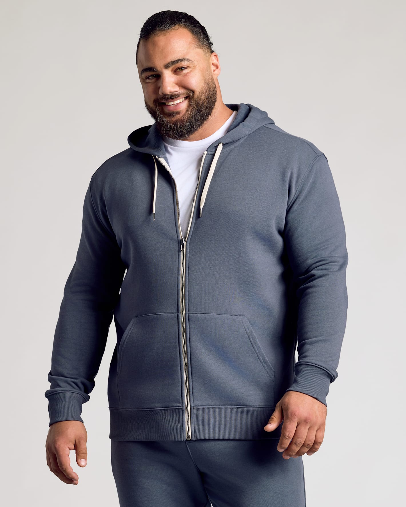 Man models Stormy Full Zip Fleece Hoodie & Jogger 2-Pack.