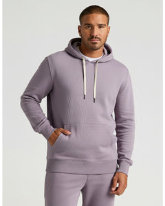True ClassicModel in Thistle Fleece French Terry Pullover Hoodie, showcasing relaxed fit.