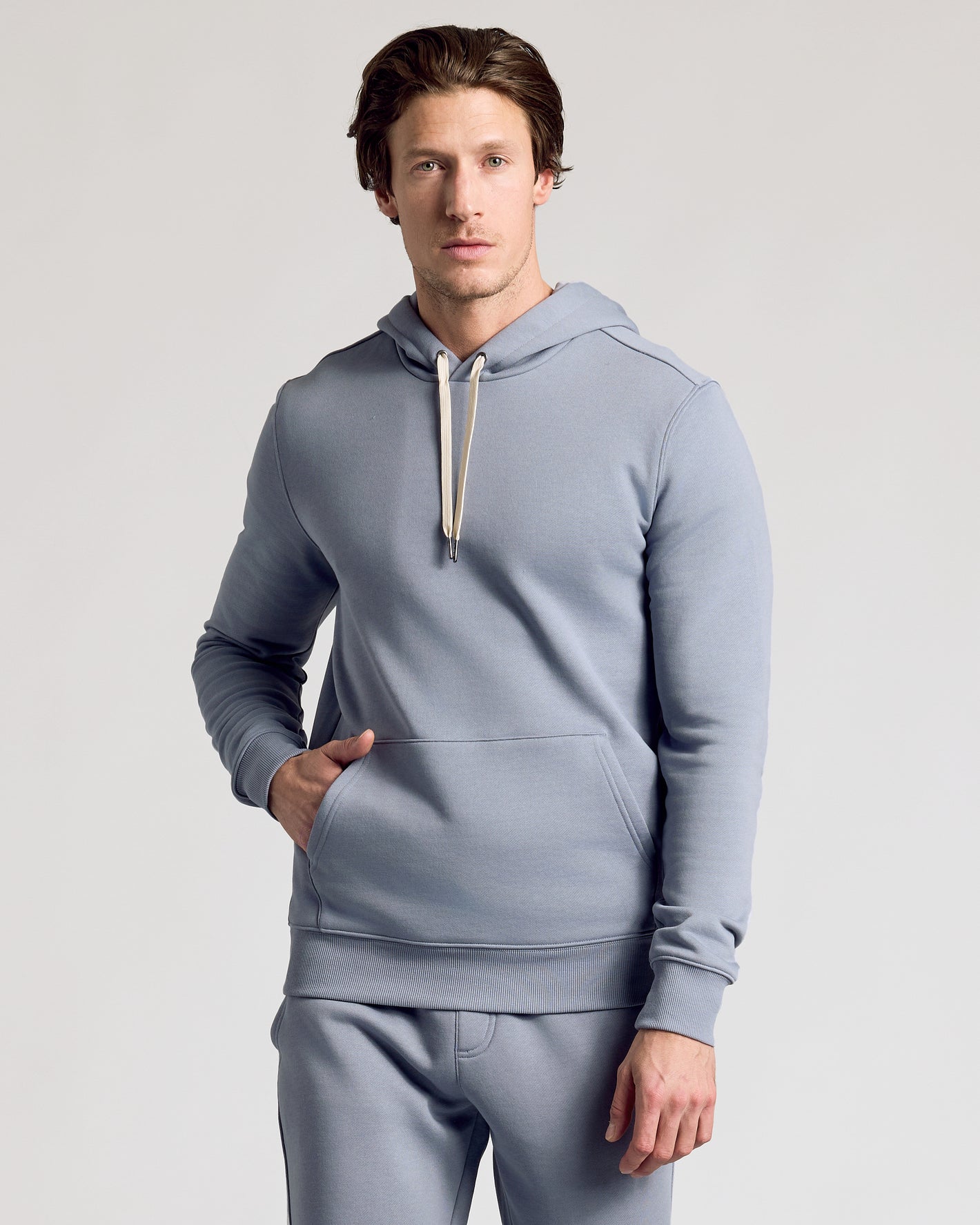 Dusty Blue Pullover Fleece Hoodie & Jogger 2-Pack worn by a young man.