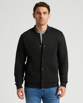 Black Fleece Bomber Jacket on male model, showcasing tailored fit and ribbed details.