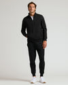 Model wearing Black Half Zip Fleece Sweatshirt & Jogger 2-Pack.