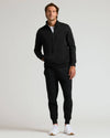 Man wearing Black Quarter Zip Fleece Sweatshirt & Jogger 2-Pack.