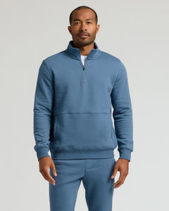 True ClassicMan modeling Fiord Half Zip Fleece Sweatshirt with joggers.